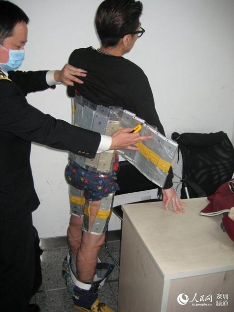 http://mashable.com/2015/01/12/iphone-suit-chinese-border/